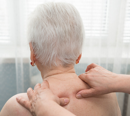 Old woman having a massageの写真素材