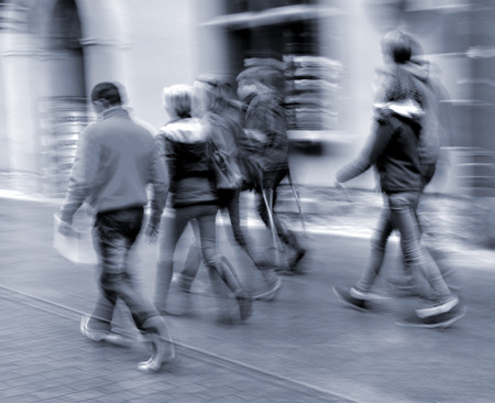 People going along the street  Intentional motion blur