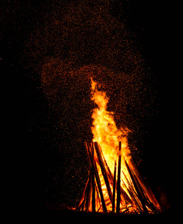 Orange fire flames on a black background