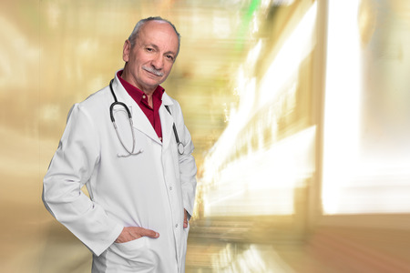 Male doctor with stethoscope in the hospitalの写真素材