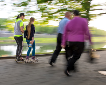 Busy city people going along the street. Intentional motion blurの写真素材