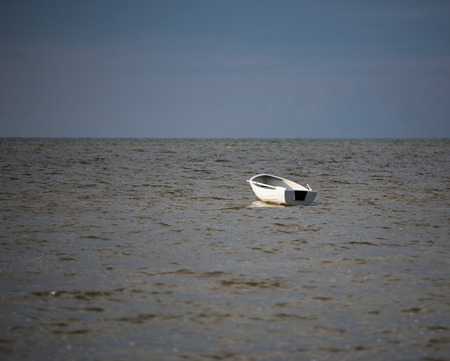 White fishing boat  in the Baltic Seaの写真素材