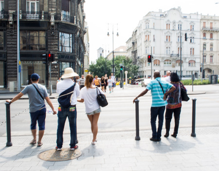 People waiting for green traffic light. Zebra crossing. Intentional motion blurのeditorial素材