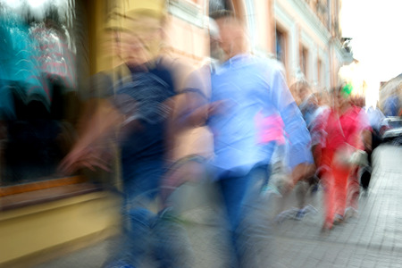 Busy city people going along the street. Intentional motion blurの写真素材