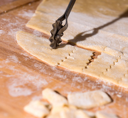 Woman making homemade pasta in the kitchenの写真素材