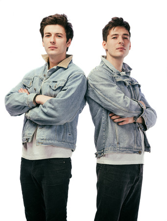 Two handsome young men on a white backgroundの写真素材