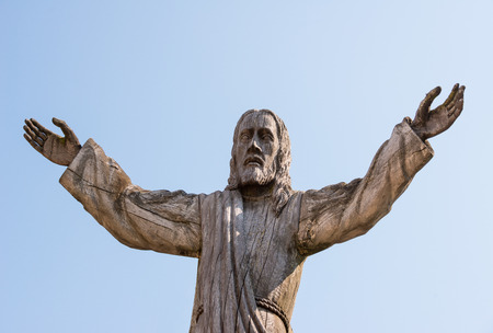 Wooden statue of Jesus Christ at the Hill of Crosses in Siauliai, Lithuania. Hill of Crosses is a unique monument of history and religious folk artの写真素材