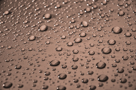 Close up water drops on metal surface can be used for web design. Abstract texture backgroundの写真素材