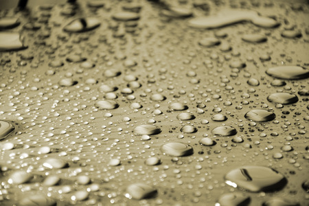 Close up water drops on metal surface can be used for web design. Abstract texture backgroundの写真素材
