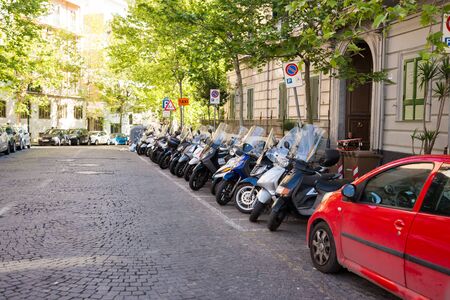 NAPLES, ITALY - MAY 2, 2019: Motobikes on the parking on the stree of Naples, Italyのeditorial素材
