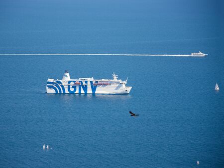 NAPLES, ITALY - MAY 2, 2019: Big white cruise ship on open waters in Naples, Italyのeditorial素材