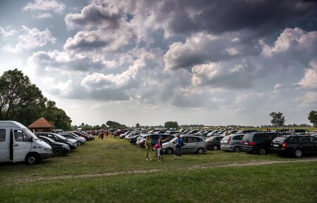 SIAULIAI, LITHUANIA - JULY 28, 2019: View of big and crowded car parking in Siauliai, Lithuania.  Hill of Crosses the most important Lithuanian Catholic pilgrimage siteのeditorial素材