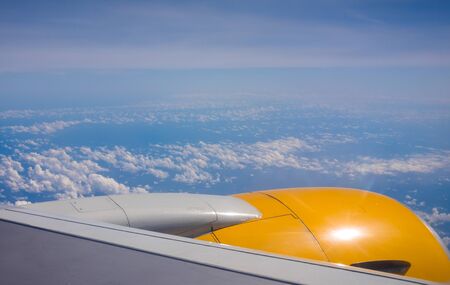 Sky with clouds, a view from an airplane above the clouds