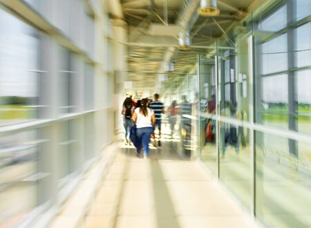 Transportation concept. Abstract blurred in airport terminal. Travelers and  tourist waiting for boarding gate before departure. Defocused imageの写真素材