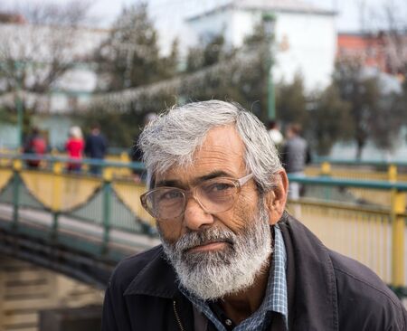 UZHGOROD, UKRAINE - OCTOBER 19, 2019: Image of homeless beggar man outdoors in Uzhhorod city, Ukraineのeditorial素材