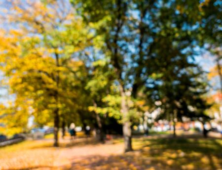 Abstract blurred background. Soft focus image of autumn city park. Defocused imageの写真素材