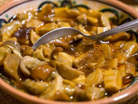 Stewed Mushrooms in a plate. Mushroom vegetarian recipe