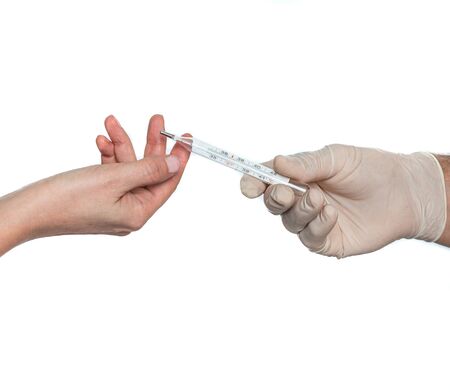 Healthcare and medicine concept. Doctor in protective gloves giving thermometer to female patient...