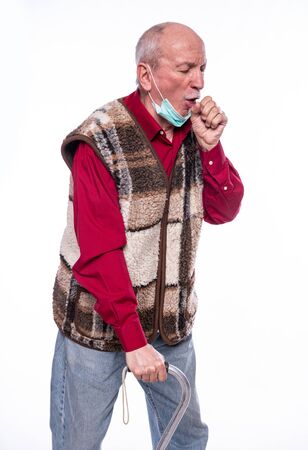 Healthcare and medicine concept. Senior man in mask suffering from coughing isolated on white backgroundの写真素材
