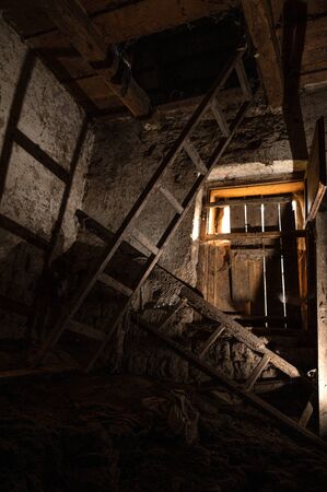  Abandoned barn in the village. Wooden ladder leads to the atticの写真素材