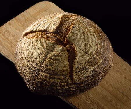 Freshly baked buckwheat bread on a wooden board