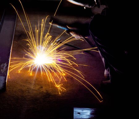 Metal welding. Arc welding of a steel in construction site