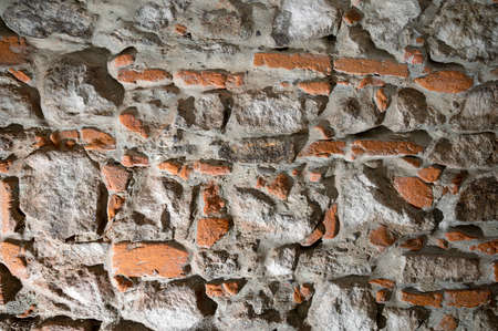 Texture of ancient stone brick wallの写真素材