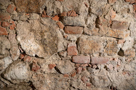 Texture of ancient stone brick wallの写真素材