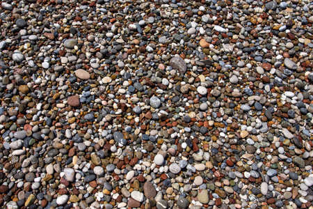 Multicolored sea pebbles, natural background, texture. Close-up texture