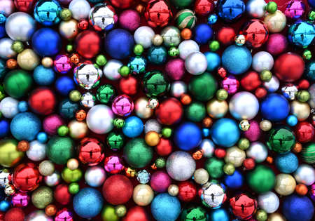 Christmas multi colored tree decorations backgroundの写真素材