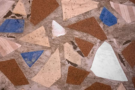 Floor made of different parts of tile. Abstract background
