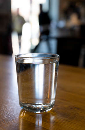 Glass of water on the table in cafe