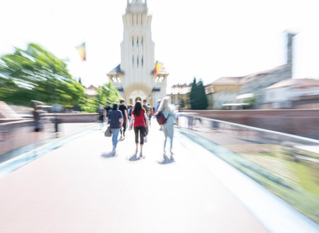 Busy city people going along the street. Intentional motion blur. Defocused imageの写真素材