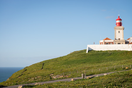 Cabo da Roca, which is the extreme western point of Europe in Sintra, Portugal. Also the lighthouse and obelisk with a large white cross.のeditorial素材