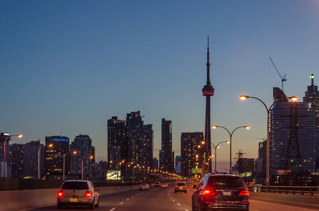 Toronto, Canada - 26 may 2013: Toronto highway at night with cars. Toronto has a population of 6M and is the provincial capital of Ontario and the largest city in Canada.のeditorial素材