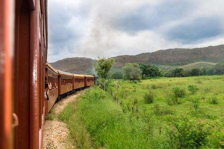 Tiradentes, Brazil, Dec 30, 2015: Tourist taking self picture in old May Smoke train in Tiradentes,...