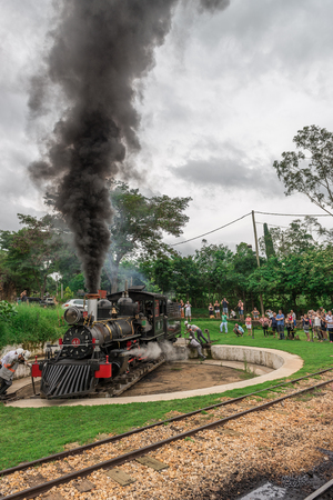 Tiradentes, Brazil, Dec 30, 2015: Old May Smoke train in Tiradentes, a Colonial Unesco World Heritage city. The train standing on a rotating switch, used to maneuver it in the correct directionのeditorial素材