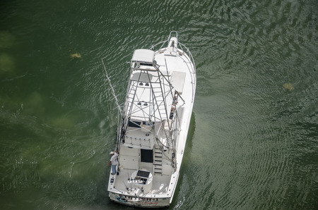 Miami, Florida, USA - October 10, 2012: Boat anchored at the Marina of Miami downtown, a landmark in...