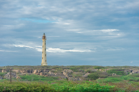 Aruba, Caribbean - September 25, 2012: The white old California Lighthouse in Aruba desert, North of Arubaのeditorial素材