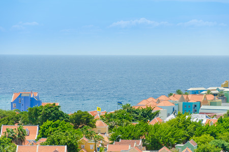 Curacao, Caribbean - September 29, 2012: Colored buildings of Willemstad  downtown with facades in Handelskade Curacao, Netherlands Antillesのeditorial素材