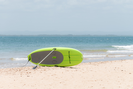 Close up of a stand up paddling in calm watersの写真素材
