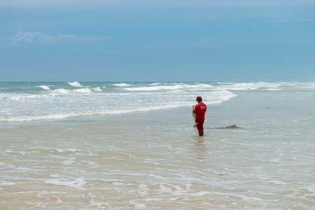 Itacare, Brazil - December 7, 2016: Fisherman at the beautiful beach and nature near Itacare in Bahia Brazilのeditorial素材