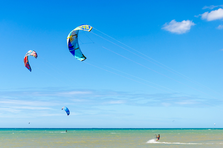 Cumbuco, Brazil, jul 9, 2017: Beach in Cumbuco at the Ceara state with multiple kite surfing sport peopleのeditorial素材