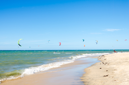 Cumbuco, Brazil, jul 9, 2017: Several kite surfing on the air at the Cumbuco beach in Cearaのeditorial素材