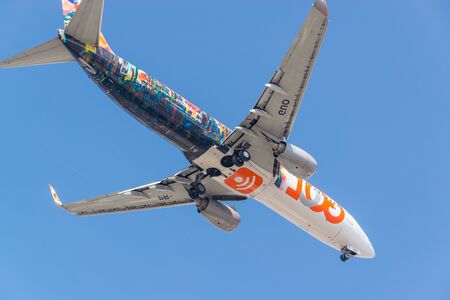 Sao Paulo, Brasil, mai 26, 2018: Big airplane flying high with detail of the land gear downのeditorial素材