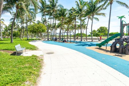 Miami, USA - jun 12, 2018: Kids having fun at the Miami beach playgroundのeditorial素材