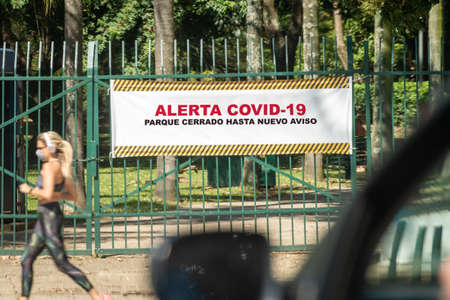 SÃ£o Paulo, Brazil - april 5, 2020: Covid-19 alert signage in spanish says: Park closed until...