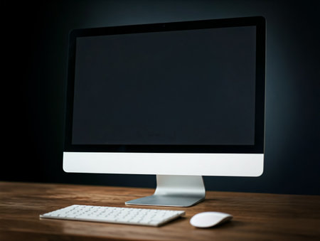 Modern computer monitor with black screen on desk in office interior, copy spaceの素材