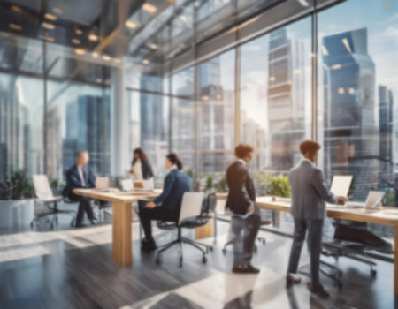 Businessmen blur in the workplace or work space of table in office room with computer or shallow depth of focus of abstract background.の素材