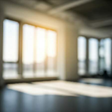 Blurred empty open space office. Abstract light bokeh at office interior background for design.の素材